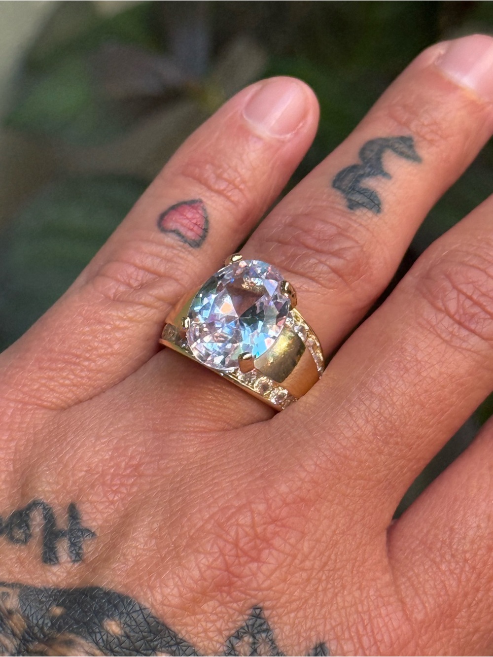 Cotton Candy colored multifaceted crystal ring
With gold tone band. Size 7